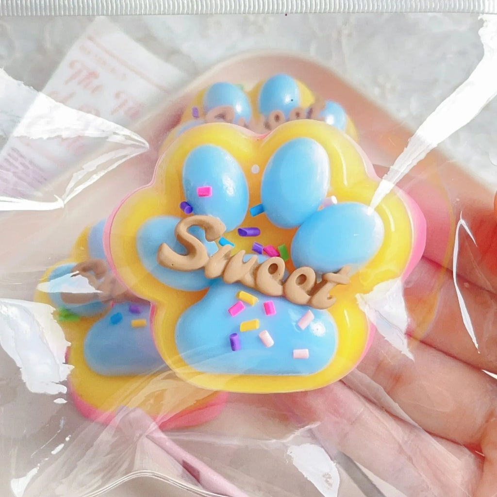 These soft, squishy, brightly colored fidget toys are the perfect stress relieving toys. The cats paw shape is super cute.