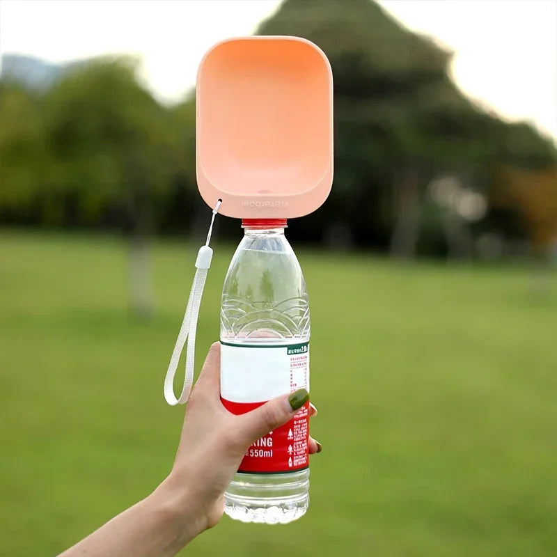 Dog Travel Water Bottle  Don't let your fur baby get overheated. These travel bowls make it super easy to keep them hydrated when they are out for a day of fun or travel. You can use these bowls with any water bottle.