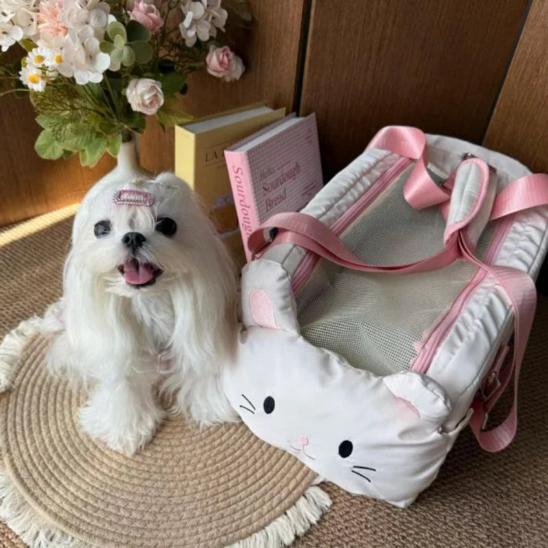 Adorable Small Pet Carrier with Easy Carrying Strap. This Carrier Will always Make Travel with Your Fur Baby Easy. Its Lightweight and Can Be used For Cats or Small Breed Dogs.