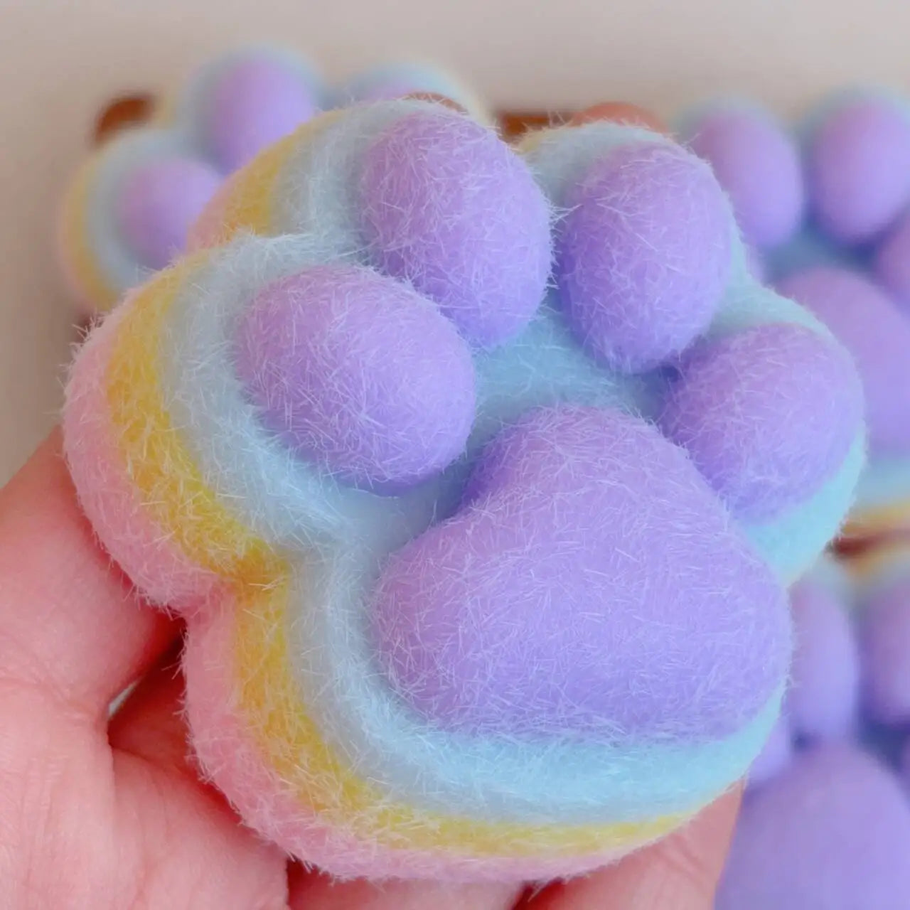 These soft, squishy, brightly colored fidget toys are the perfect stress relieving toys. The cats paw shape is super cute.