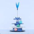 This Cat Tower can Provide Hours of Fun for your Pet. There are 3 Layers of circles With Balls and Feathers attached to a Spring. Choose From 4 Different colors.