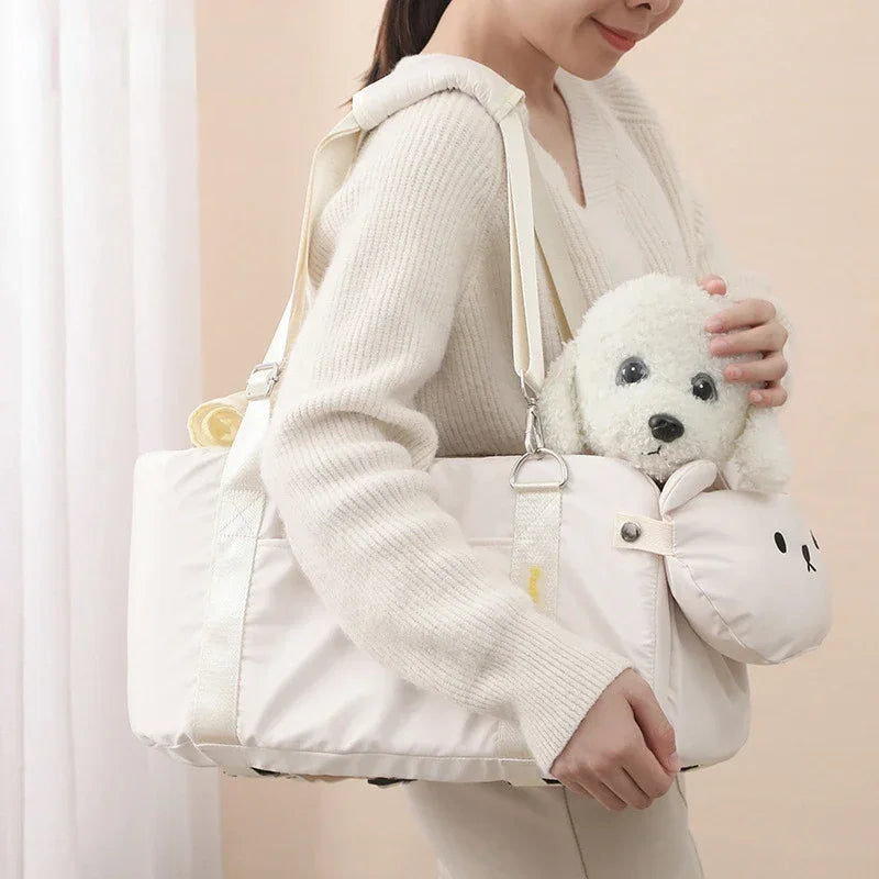 Adorable Small Pet Carrier with Easy Carrying Strap. This Carrier Will always Make Travel with Your Fur Baby Easy. Its Lightweight and Can Be used For Cats or Small Breed Dogs.